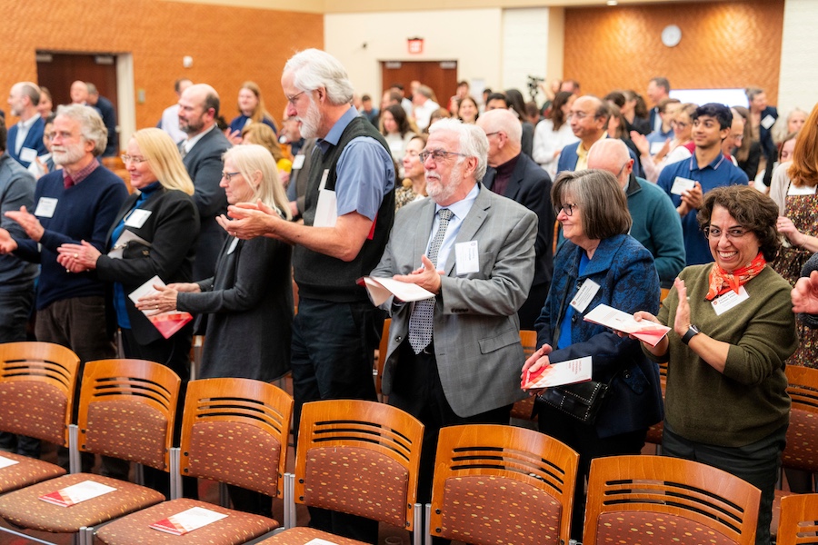 Audience members stand and applaud at the 2024 awards ceremony