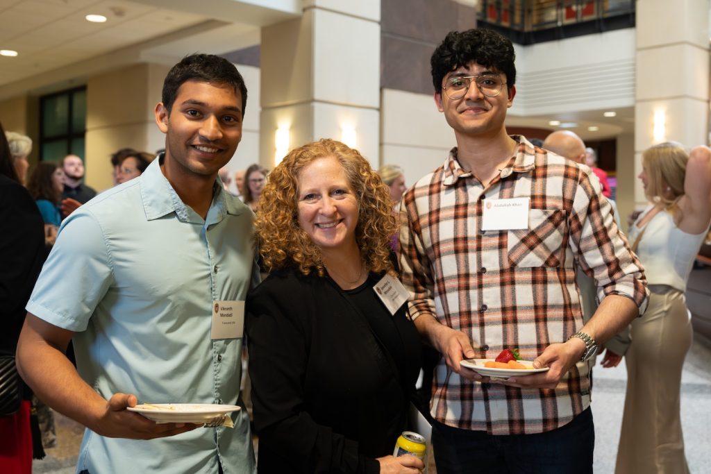 Jennifer Mnookin with two guests at the awards ceremony